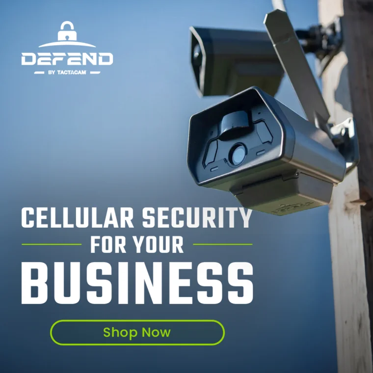 Two security cameras on a pole with the text "Cellular Security for Your Business" and a "Shop Now" button against a blue background.
