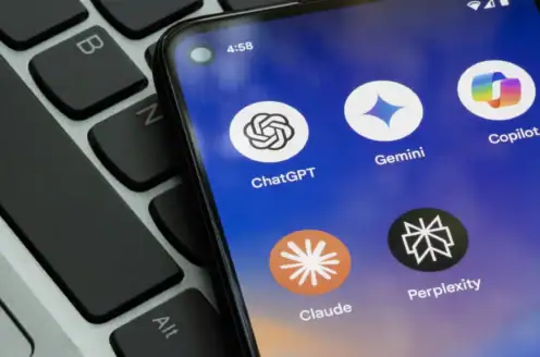A smartphone screen showing AI apps including ChatGPT, Gemini, Copilot, Claude, and Perplexity.