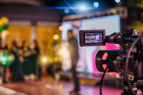 A broadcast camera in a studio.