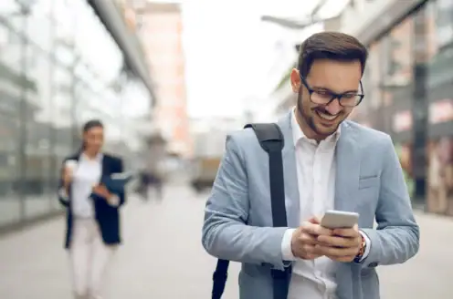 A man looking at his phone.