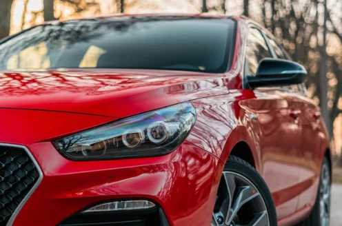 A red car outside.