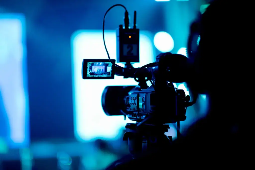 A broadcast camera in a studio.