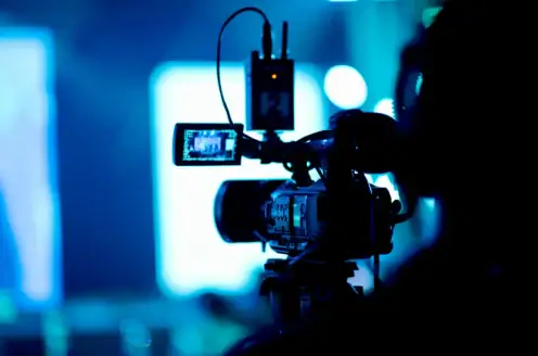 A broadcast camera in a studio.