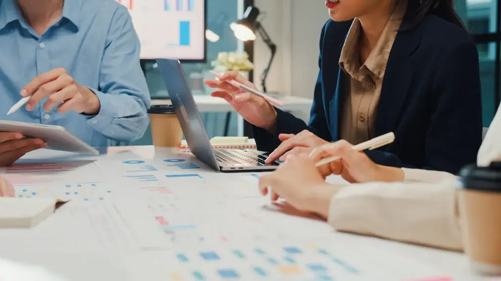 A group of people in a work meeting.