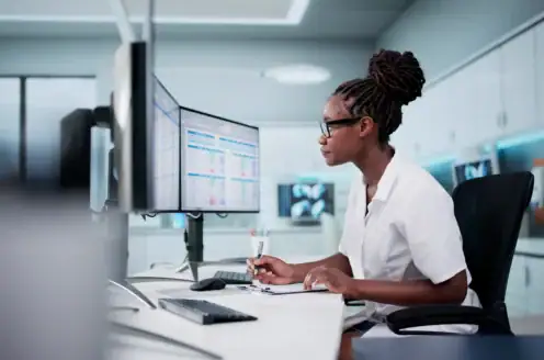 A woman working in an office.